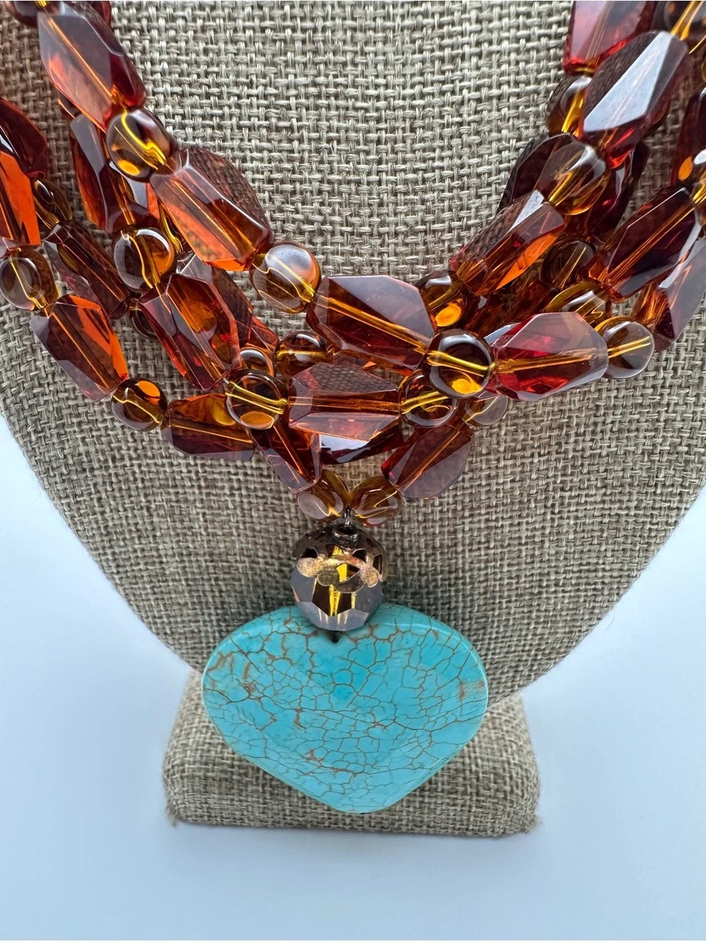 Multi-Strand Amber Glass Necklace with Turquoise Heart Pendant
